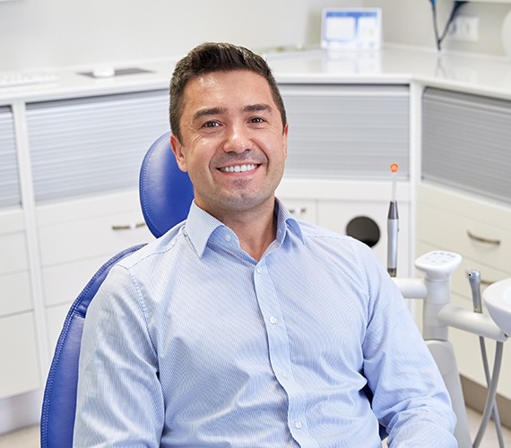 Man smiling after preventive dentistry checkup