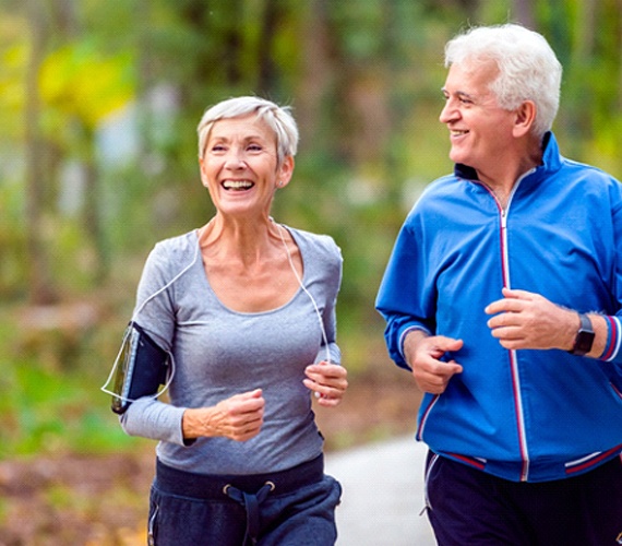 Senior couple jogging outside with All-on-4 in Forth Worth, TX