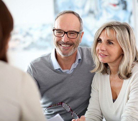 couple at a dental implant consultation