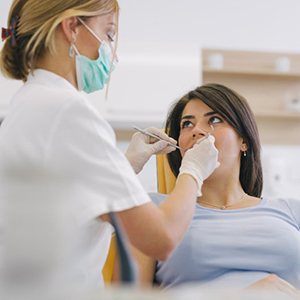 a patient undergoing scaling and root planing