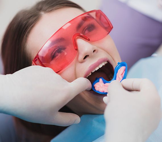 Patient receiving fluoride treatment