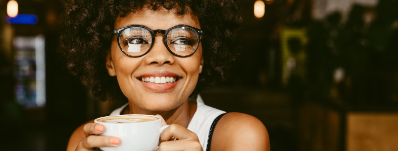 Woman smiling after restorative dentistry treatment