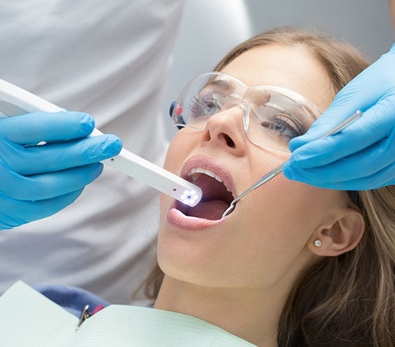 Dentist capturing intraoral images