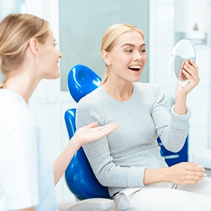 a patient appreciating the cost of veneers in Fort Worth