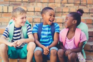 Healthy children's smiling at school after visiting children's dentist