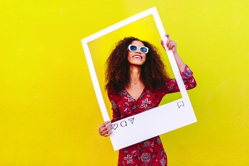 a social media influencer smiling with veneers in Fort Worth