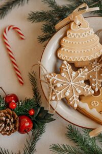 Candy cane and cookies on holiday table